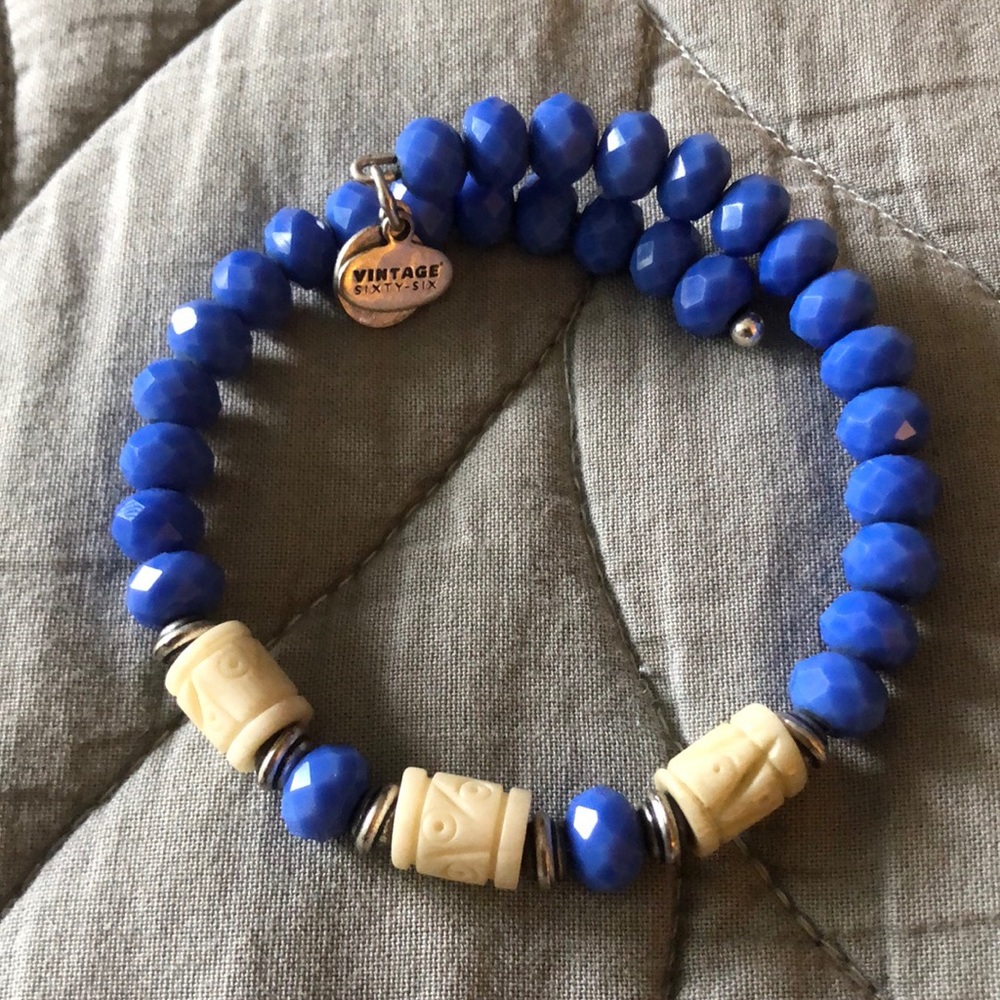 Alex and Ani vintage sixty six bangle with blue and carved ivory beads